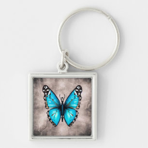 Blauer Vintager Schmetterling Schlüsselanhänger