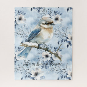 Blauer Vogel auf einem Ast