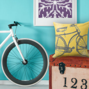 Blaues Fahrrad auf Gelbkissen Kissen