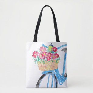 Blaues Fahrrad mit Korb der roten Blumen Tasche