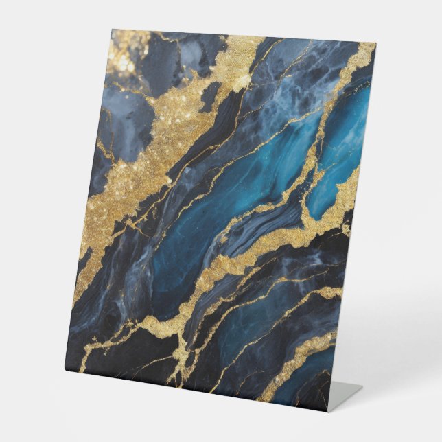 Blaues Marmormuster mit Gold Sockelschild (Vorderseite)