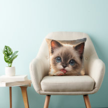 Blaugäugige Siamkatze, Kitten leckt seine Pfote