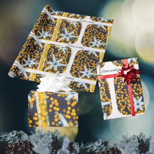 Blaugelb leuchtende Weihnachtssterne Geschenkpapier