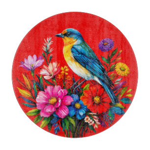 Blaumeise zwischen farbenfrohen Frühlingsblumen si Schneidebrett