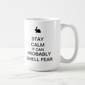 Bleibe Sie ruhige Tasse