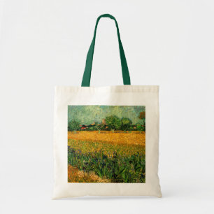 Blick auf Arles mit Schwertlilien von Vincent van  Tragetasche