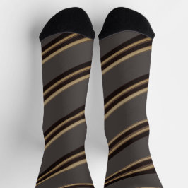 Blinky die Fledermaus versteckt sich in Streifenmu Socken