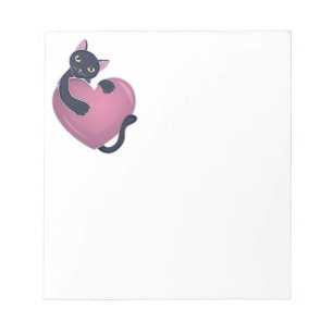 Bloc-note Cute chat noir se tenant sur le grand coeur