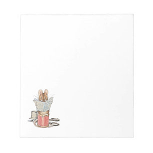 Bloc-note Souris de tailleur sur la bobine du fil