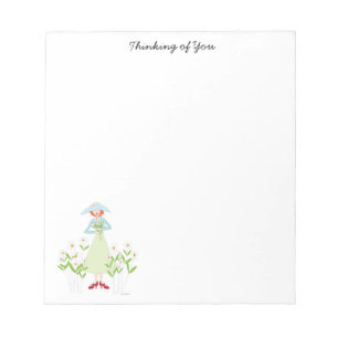 Bloc-note Une fille dans un jardin de chaises