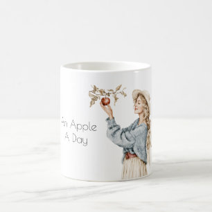 Blonde Frau Blaues Sweatshirt Apfel Pro Tag Kaffeetasse