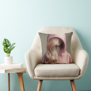 Blondes Teenagermädchen in einem rosa Hoodie Kissen