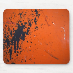 Blpaint splatter on orange mousepad