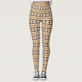 Blue and black tribal patterns on khaki coloured leggings