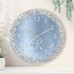 Blue Brushed Metal Silver Glitter Monogram Name Große Wanduhr<br><div class="desc">Easily personalize this trendy chic wall clock design featuring pretty silver sparkling glitter on a blue brushed metallic background.</div>