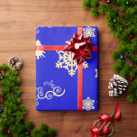 Blue Christmas Wrap with Cream Snowflakes Geschenkpapier<br><div class="desc">A festive pattern of cream swirls,  snowflakes and Christmas trees scattered over a bright blue background to give your gift wrapping a vibrant and colorful look for the holidays this year.</div>