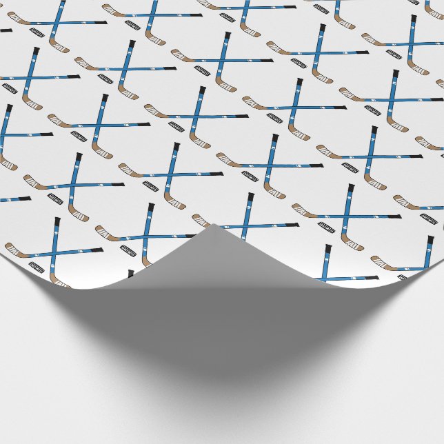 Blue Crossed Hockey Sticks und Puck Geschenkpapier (Ecke)