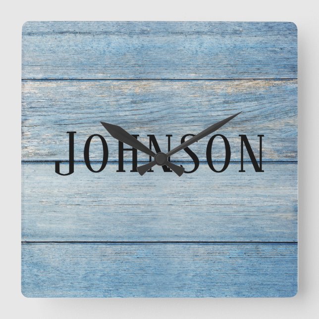 blue faded wood with family name quadratische wanduhr (Vorderseite)