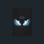 Blue Glowing Angel Wings on black background Leinwanddruck<br><div class="desc">Light,  artistic,  blue angel wings on a black background. Angel wings.</div>