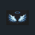 Blue Glowing Angel Wings on black background Leinwanddruck<br><div class="desc">Light,  artistic,  blue angel wings on a black background. Angel wings.</div>