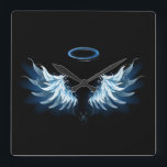 Blue Glowing Angel Wings on black background Quadratische Wanduhr<br><div class="desc">Light, artistic, blue angel wings on a black background. Angel wings.</div>