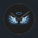 Blue Glowing Angel Wings on black background Runde Wanduhr<br><div class="desc">Light, artistic, blue angel wings on a black background. Angel wings.</div>