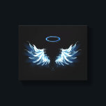 Blue Glows Angel Wings auf schwarzem Hintergrund Leinwanddruck<br><div class="desc">Helle,  künstlerische,  blaue Engelsflügel auf schwarzem Hintergrund. Engel Flügel.</div>