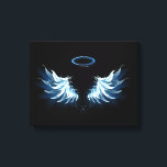 Blue Glows Angel Wings auf schwarzem Hintergrund Leinwanddruck<br><div class="desc">Helle,  künstlerische,  blaue Engelsflügel auf schwarzem Hintergrund. Engel Flügel.</div>