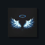 Blue Glows Angel Wings auf schwarzem Hintergrund Leinwanddruck<br><div class="desc">Helle,  künstlerische,  blaue Engelsflügel auf schwarzem Hintergrund. Engel Flügel.</div>