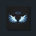 Blue Glows Angel Wings auf schwarzem Hintergrund Leinwanddruck<br><div class="desc">Helle,  künstlerische,  blaue Engelsflügel auf schwarzem Hintergrund. Engel Flügel.</div>