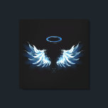 Blue Glows Angel Wings auf schwarzem Hintergrund Leinwanddruck<br><div class="desc">Helle,  künstlerische,  blaue Engelsflügel auf schwarzem Hintergrund. Engel Flügel.</div>