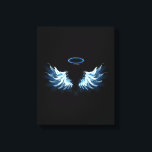 Blue Glows Angel Wings auf schwarzem Hintergrund Leinwanddruck<br><div class="desc">Helle,  künstlerische,  blaue Engelsflügel auf schwarzem Hintergrund. Engel Flügel.</div>