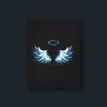 Blue Glows Angel Wings auf schwarzem Hintergrund Leinwanddruck<br><div class="desc">Helle,  künstlerische,  blaue Engelsflügel auf schwarzem Hintergrund. Engel Flügel.</div>