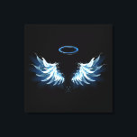 Blue Glows Angel Wings auf schwarzem Hintergrund Leinwanddruck<br><div class="desc">Helle,  künstlerische,  blaue Engelsflügel auf schwarzem Hintergrund. Engel Flügel.</div>