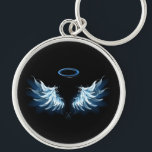 Blue Glows Angel Wings auf schwarzem Hintergrund Schlüsselanhänger<br><div class="desc">Helle,  künstlerische,  blaue Engelsflügel auf schwarzem Hintergrund. Engel Flügel.</div>