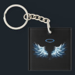 Blue Glows Angel Wings auf schwarzem Hintergrund Schlüsselanhänger<br><div class="desc">Helle,  künstlerische,  blaue Engelsflügel auf schwarzem Hintergrund. Engel Flügel.</div>