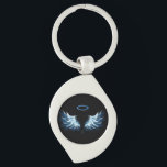 Blue Glows Angel Wings auf schwarzem Hintergrund Schlüsselanhänger<br><div class="desc">Helle,  künstlerische,  blaue Engelsflügel auf schwarzem Hintergrund. Engel Flügel.</div>