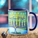 Blue Green Hanukkah Menorah Peace Love Light Quote Tasse<br><div class="desc">"Peace, love & light." A close-up foto illustration of a bright, colorful, blue and green artsy menorah helps you usher in the holiday of Hanukkah in style. Feel the warmth and joy of the holiday season whenever you drink out of this stunning, colorful Hanukkah coffee mug. Makes a striking set...</div>