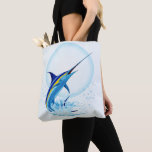Blue Marlin Jumping out of Ocean Tasche<br><div class="desc">Realistic illustration of a beautiful Marlin Fish Ocean Animal jumping out of ocean. Vector Art copyright BluedarkArt TheChameleonArt.</div>