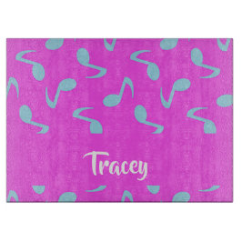 Blue musical notes on pink schneidebrett