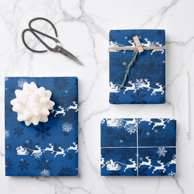 Blue Santa's Sleigh and Rentier Wrapping Paper Geschenkpapier Set (Vorderseite)