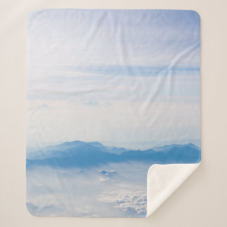 Blue sky and mountains view from airplane stylized sherpadecke
