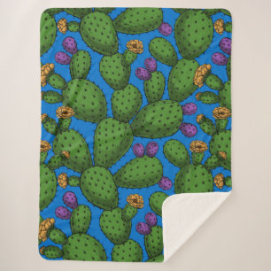 Blühende Opuntia auf blau Sherpadecke