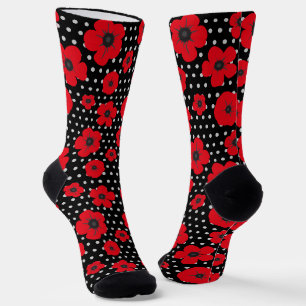 Blume aus rotem Mohn auf schwarzen und weißen Flec Socken