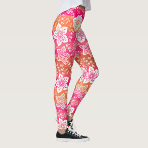 Blume aus weißem Paisley auf heißen rosa, orange Leggings