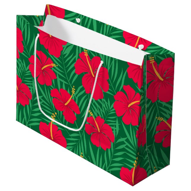 Blume des Roten Hibiskus über tropische Blätter Große Geschenktüte (Vorderseite Schrägansicht)