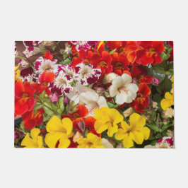 Blume in leuchtenden Farben Fußmatte