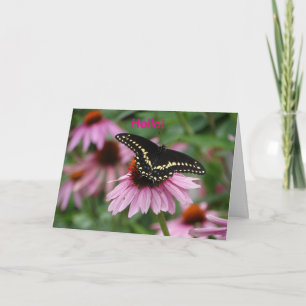 Blume mit Schmetterling aus schwarzem Frack. Karte