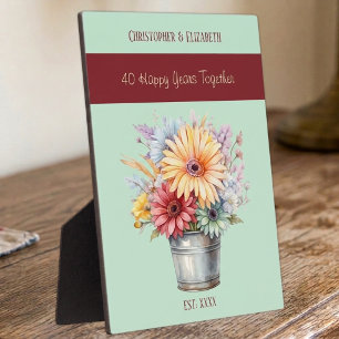 Blume zum 40-jährigen Ruby-Jubiläum geben grüne Na Fotoplatte