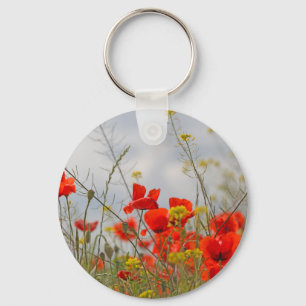 Blumen der gemeinen Mohnblume auf einem Gebiet Schlüsselanhänger